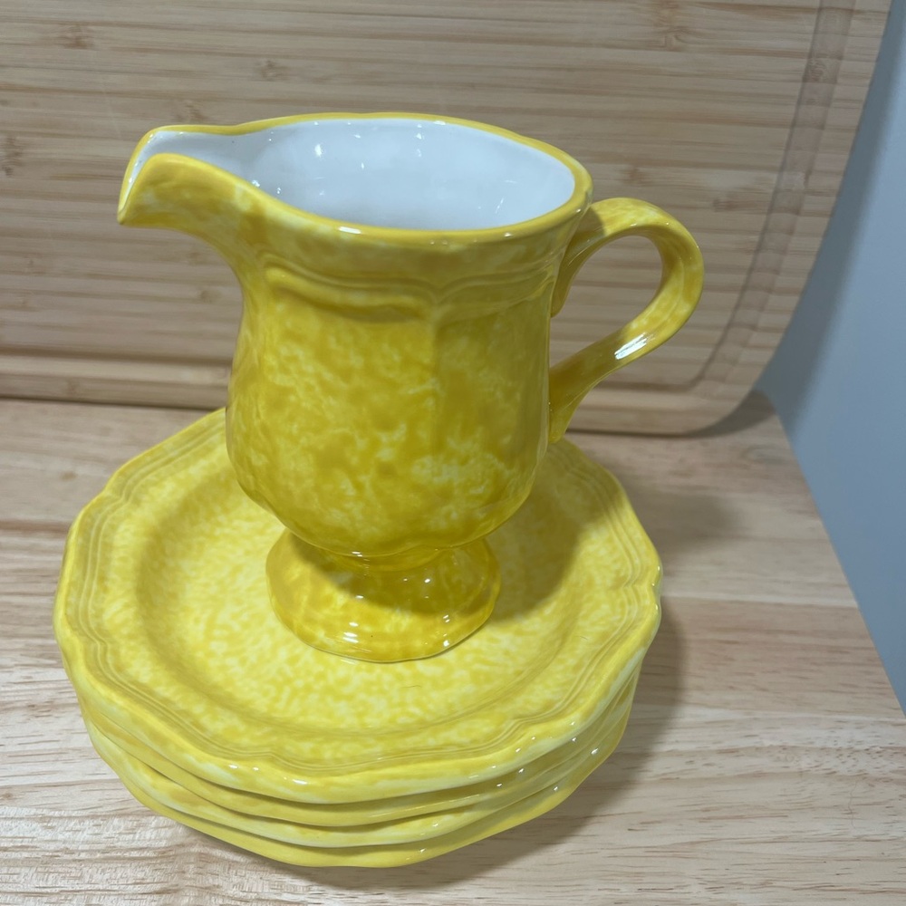 Vintage Mikasa creamer and 4 saucers